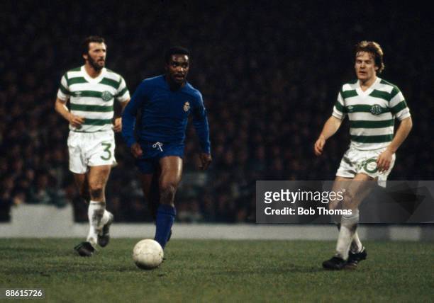 Real Madrid winger Laurie Cunningham moves between Celtic defenders Danny McGrain and Murdo MacLeod during their European Cup 3rd round tie at...
