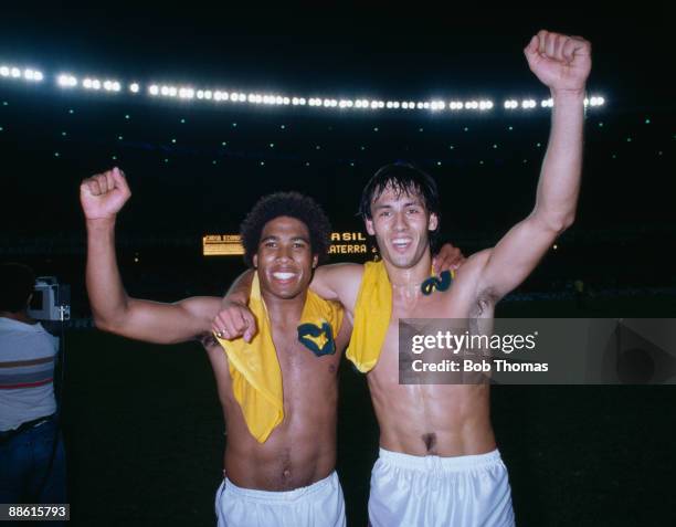 England goalscorers John Barnes and Mark Hateley celebrate at the end of the International friendly between Brazil and England at the Maracana...