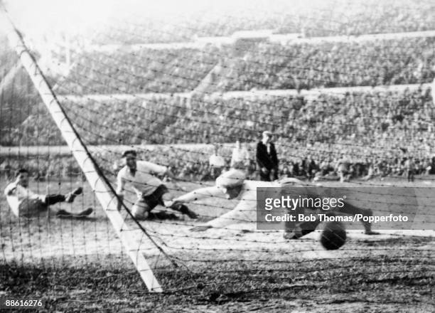 Argentinian goalkeeper Juan Botasso is beaten by Pedro Cea's shot for Uruguay's 2nd goal during the FIFA World Cup Final between Uruguay and...
