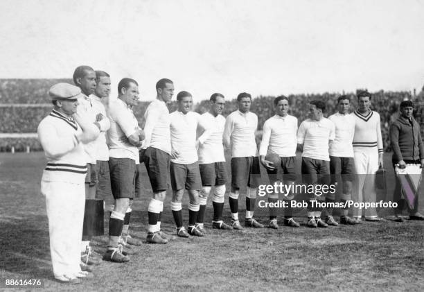 The Uruguayan team line up before the FIFA World Cup match against Romania at the Estadio Centenario in Montevideo, 21st July 1930. Left-right:...