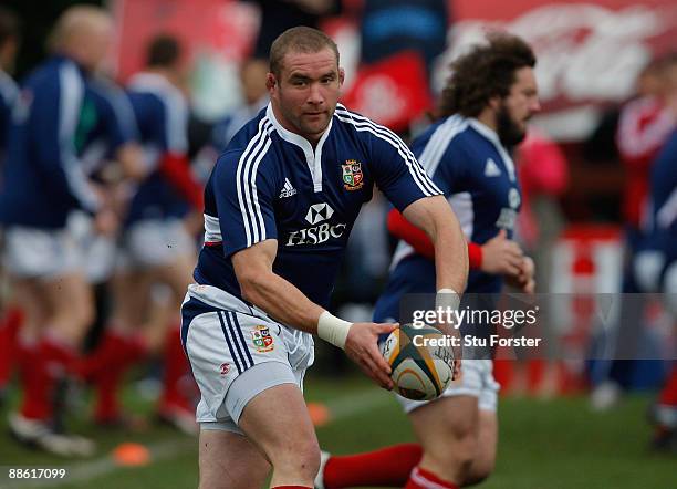 Lions forward Phil Vickery passes the ball during British and Irish Lions training at Bishops school on June 22, 2009 in Cape Town, South Africa.