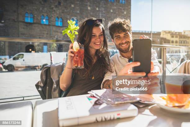 couple of tourists in florence, travelling around italy - aperitivo stock pictures, royalty-free photos & images