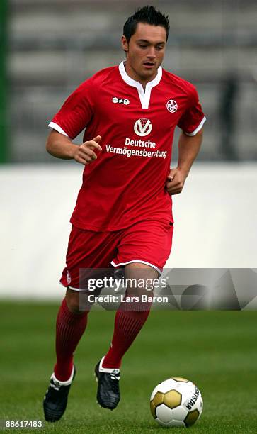 Alper Akcam runs with the ball during the 1. FC Kaiserslautern team presentation on June 22, 2009 in Kaiserslautern, Germany.