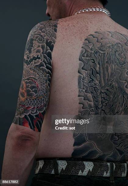 man with tattoo, rear view,close up - tiger image tattos stock pictures, royalty-free photos & images