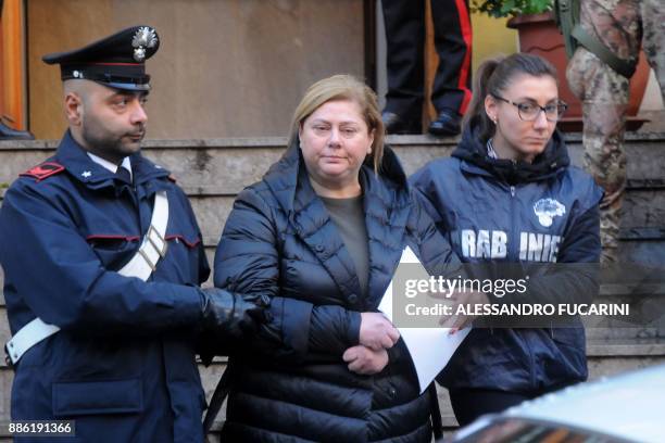 Maria Angela Di Trapani , a female mobster suspected of being the mastermind behind a reshuffle of the Sicilian Mafia following the death of "boss of...