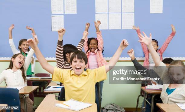 students cheering in classroom - celebrates pride in la ストックフォトと画像