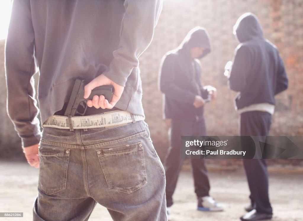 Man with gun robbing drug dealers