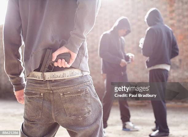 man with gun robbing drug dealers - kriminell bildbanksfoton och bilder