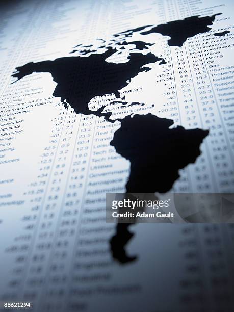 world map on list of share prices - hispanoamérica fotografías e imágenes de stock