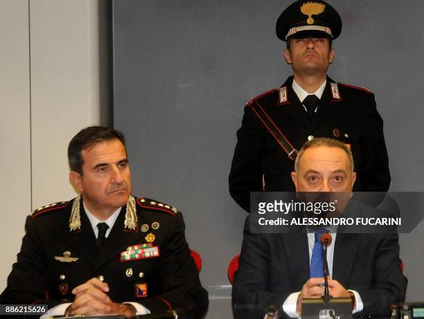 Colonel of Carabinieri Antonio Di Stasio and prosecutor Franco Lo Voi give a press conference following a police operation, on December 5, 2017 in...