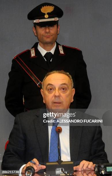 Prosecutor Franco Lo Voi gives a press conference following a police operation, on December 5, 2017 in Palermo. Maria Angela Di Trapani, a female...