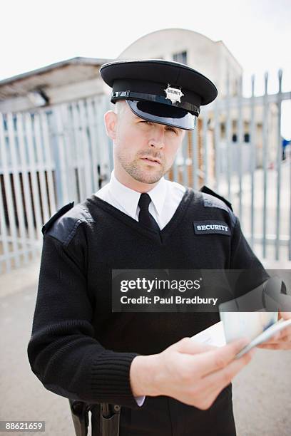 169 Security Guard Checking Identification Stock Photos, High-Res ...