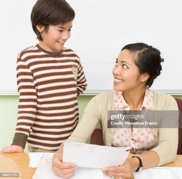 Homework Checking Teacher Checking Homework Photos and Premium High Res Pictures - Getty ...