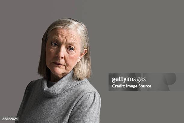 senior woman looking worried - old person portrait stock pictures, royalty-free photos & images