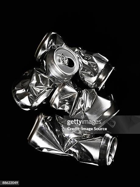 crumpled aluminium cans - crushed tin stock pictures, royalty-free photos & images