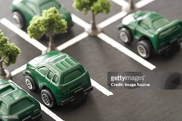 eco cars in parking lot - tesla model s stock pictures, royalty-free photos & images