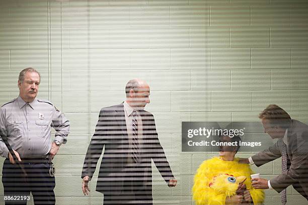 man in chicken suit in police interview - interview funny stock pictures, royalty-free photos & images