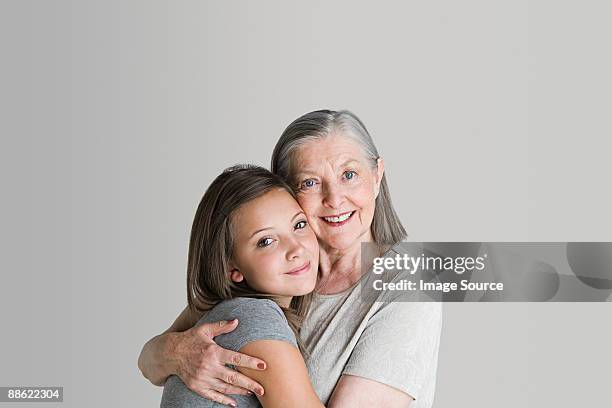 girl and grandmother - granddaughter foto e immagini stock