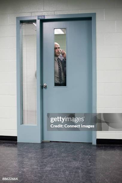 detective behind door - police station stock pictures, royalty-free photos & images