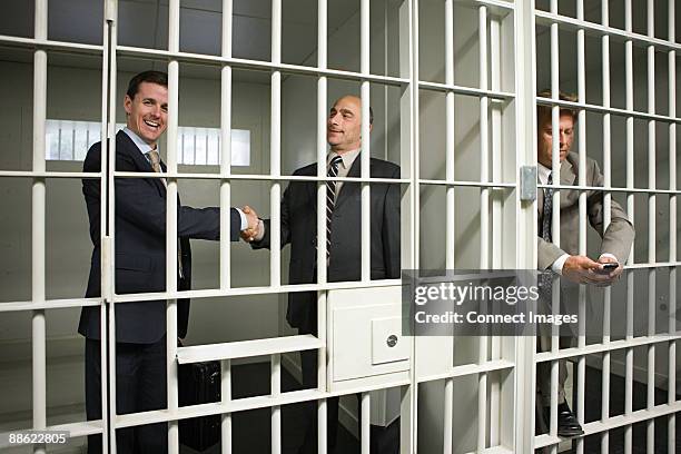 Businessmen In Jail, Bildbanksbilder