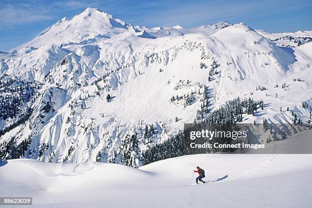 man ski touring at artist's point - mt baker stock pictures, royalty-free photos & images