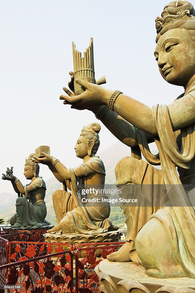 Statues near tian tan buddha