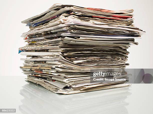 stack of newspapers - pile of paper stock pictures, royalty-free photos & images