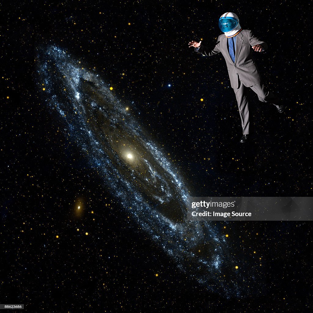 Businessman in outer space