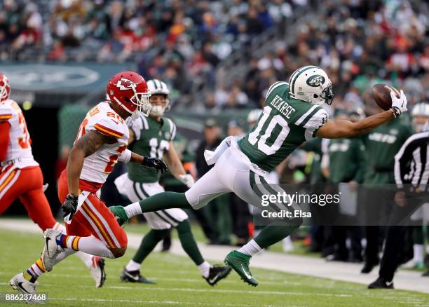 Jermaine Kearse of the New York Jets makes the first down catch as Steven Nelson of the Kansas City Chiefs defends in the fourth quarter on December...