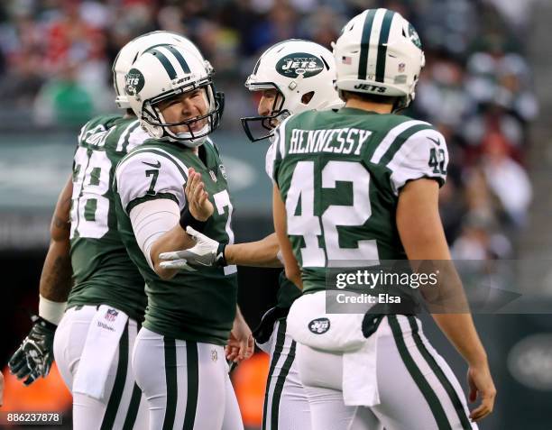 Chandler Catanzaro of the New York Jets is congratulated after he kicked a field goal against the Kansas City Chiefs on December 03, 2017 at MetLife...