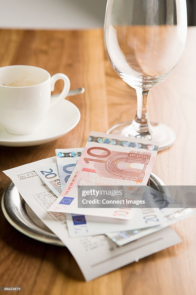 The bill on a table