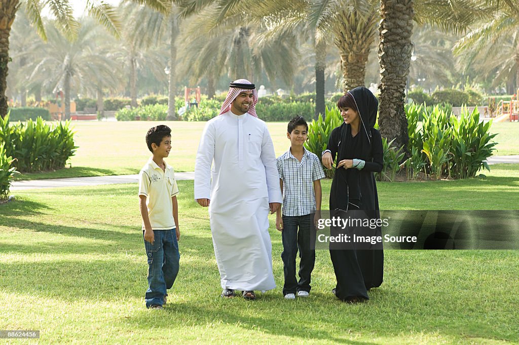 A family walking through a park