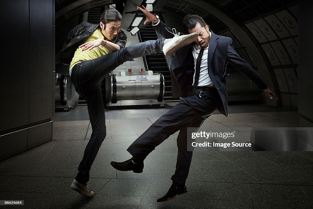 Two men fighting