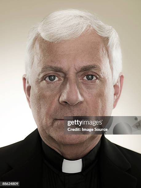 a headshot of a priest - priest collar stock pictures, royalty-free photos & images