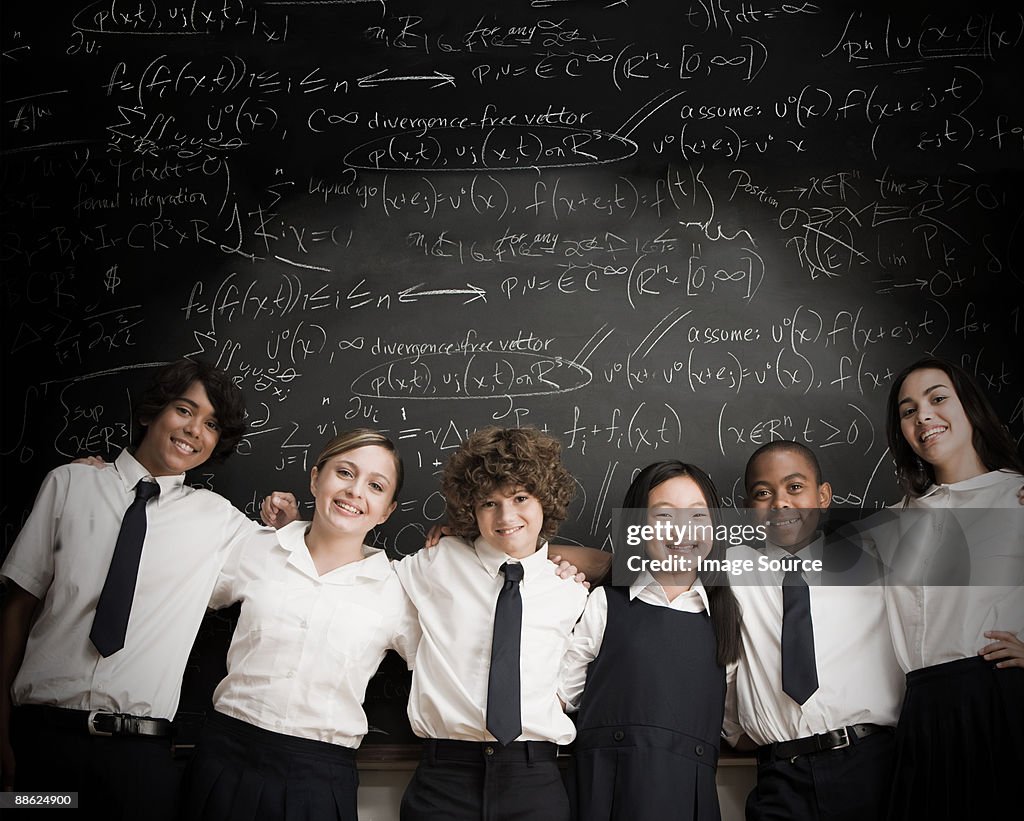 Students in front of blackboard