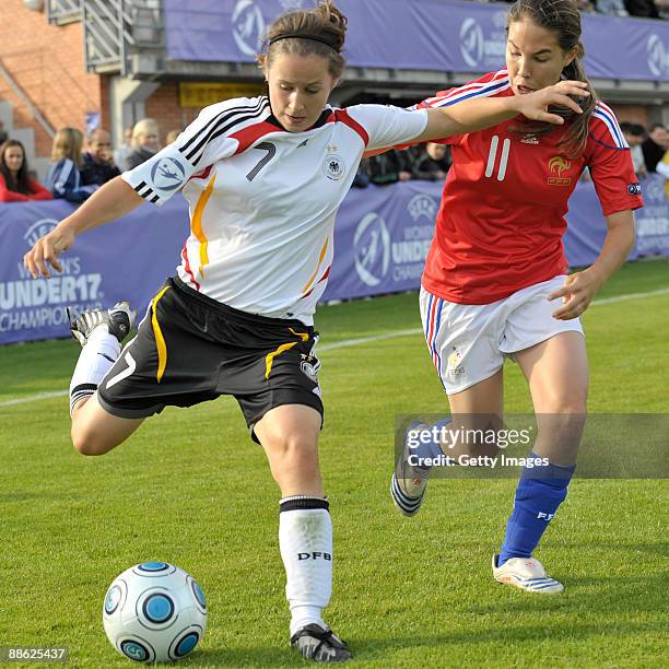 Nicole Rolser of Germany and Tatiana Solanet of France battle for the ball during the UEFA Women's U17 Championship semifinal match between Germany...