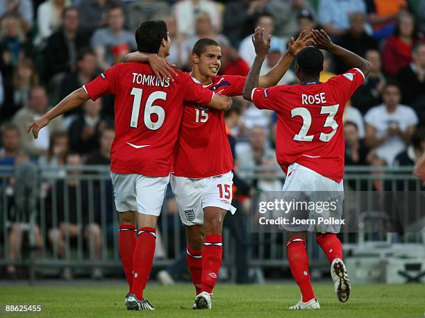 Jack Rodwell of England celebrates with his team mates James Tomkins and Danny Rose after scoring his team�s first goal during the UEFA U21...