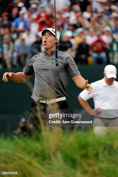 Ricky Barnes reacts on the 18th green after a missed birdie putt during the continuation of the final round of the 109th U.S. Open on the Black...
