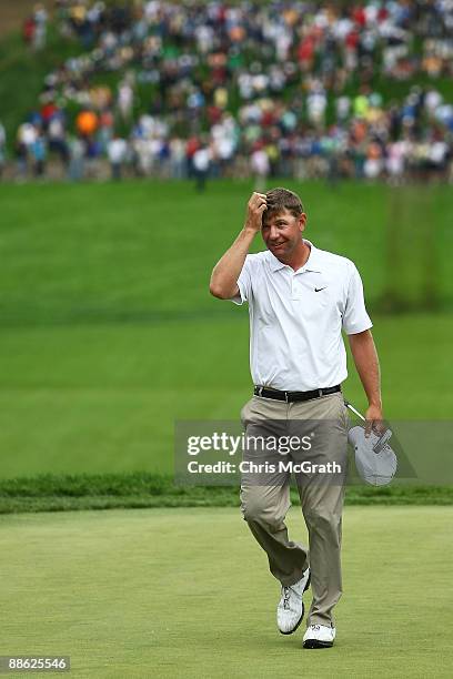 Lucas Glover celebrates his two-stroke victory on the 18th green at the 109th U.S. Open on the Black Course at Bethpage State Park on June 22, 2009...