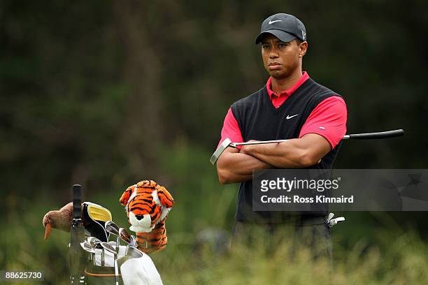 Tiger Woods looks on from the 14th tee during the continuation of the final round of the 109th U.S. Open on the Black Course at Bethpage State Park...