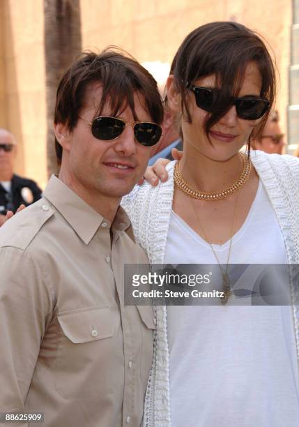 Actors Tom Cruise and Katie Holmes attend the ceremony honoring Cameron Diaz with a star on The Hollywood Walk of Fame on June 22, 2009 in Hollywood,...