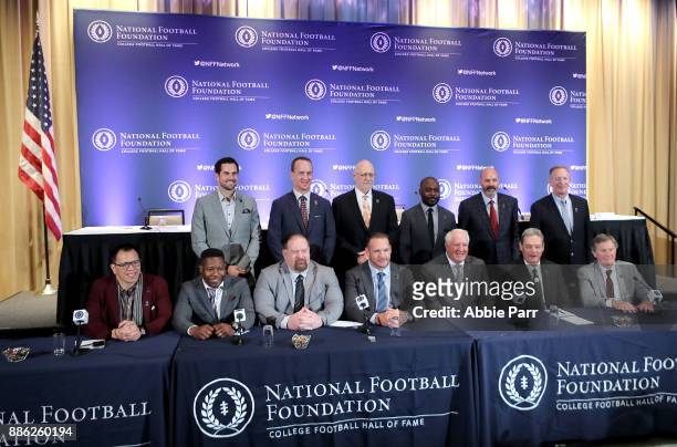 The 2017 College Hall of Fame class poses for a photo during the press conference for the 60th NFF Anual Awards Ceremony at New York Hilton Midtown...