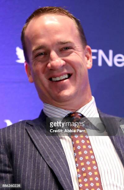 Peyton Manning smiles among the 2017 College Football Hall of Fame Class during the press conference for the 60th NFF Anual Awards Ceremony at New...