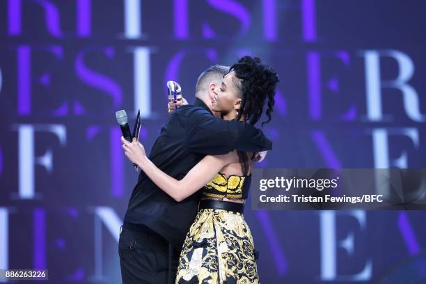 Craig Green winner of the British Designer of the Year Menswear award and FKA Twigs on stage during The Fashion Awards 2017 in partnership with...