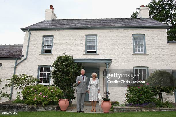 Camilla, Duchess of Cornwall and Prince Charles, Prince of Wales pose for a photograph outside their welsh property Llwynywermod before a drinks...