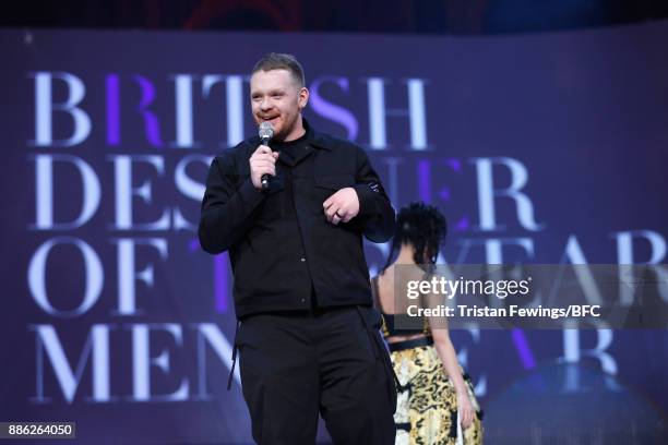 Craig Green winner of the British Designer of the Year Menswear award and FKA Twigs on stage during The Fashion Awards 2017 in partnership with...