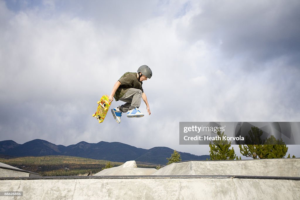 A young skateboarder catches some air.