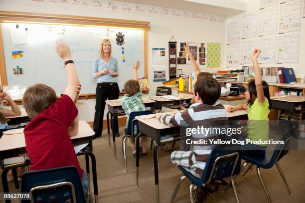 teacher leading elementary school class - manchester vermont stockfoto's en -beelden