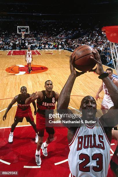 Michael Jordan of the Chicago Bulls rises to the basket against the Atlanta Hawks in Game Two of the Eastern Conference Semifinals during the 1997...
