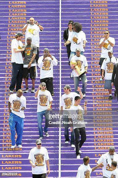 The Los Angeles Lakers descend the steps during the Los Angeles Lakers NBA Finals Championship Victory Rally on June 17, 2009 at the Los Angeles...